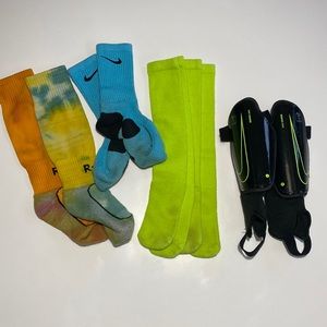 Nike soccer bundle, 4 pairs of socks & shin guards